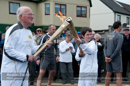 John Nicolson passes the Olympic Flame to Bryden Priest of Unst