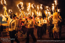 Guizers encircle the Galley before singing, cheering and setting the Galley Nordastour alight with their torches at Uyeasound Up Helly-Aa 2014