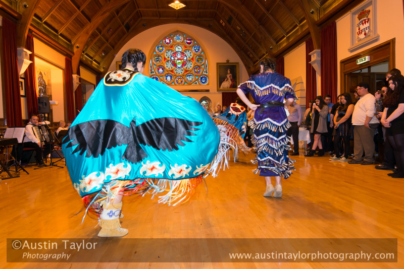 Kali Baptiste (black and gold top), Jenna Bower (white and red top) and their friend (with 100 bells) perform traditional Indian dances at Civic Reception at Lerwick Town Hall, Shetland for the Spirit Dancer Shetland Committee exchange visit by young people from the Osoyoos Indian and Penticton Indian Bands from Canada to Shetland on 27 April 2015
