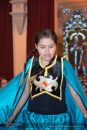 Kali Baptiste (black and gold top), Jenna Bower (white and red top) and their friend (with 100 bells) perform traditional Indian dances at Civic Reception at Lerwick Town Hall, Shetland for the Spirit Dancer Shetland Committee exchange visit by young people from the Osoyoos Indian and Penticton Indian Bands from Canada to Shetland on 27 April 2015