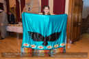 Kali Baptiste with her Osoyoos Indian silk fancy style dance shawl that shows an eagle and is Okanagan in origin) at Civic Reception at Lerwick Town Hall, Shetland for the Spirit Dancer Shetland Committee exchange visit by young people from the Osoyoos Indian and Penticton Indian Bands from Canada to Shetland on 27 April 2015