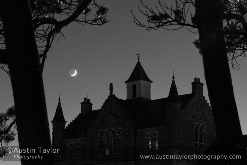 Islesburgh Community Centre with a new moon, Lerwick