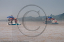 Boats for tourists to view Leshan Giant Buddha, Min River, Sichuan