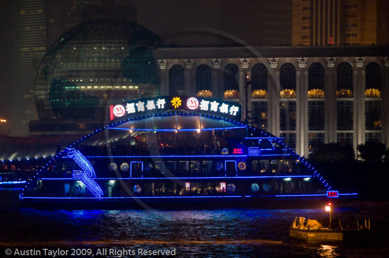 Illuminated sightseeing boats on the Huangpu River at night, Shanghai