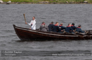Matthew Cox with the flame on board the Vaila Mae