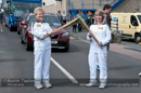 Belle Spence passes the flame to Megan Keppie