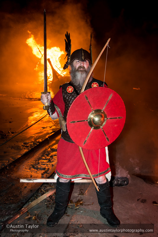 Guizer Jarl Keith Lobban and his burning galley at Gulberwick - South Mainland Up Helly-Aa 2014