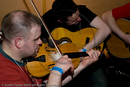 Festival goers and sessions at the Folk Festival Club for the 29th Shetland Folk Festival 2009