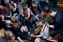 Festival goers and sessions at the Folk Festival Club for the 29th Shetland Folk Festival 2009