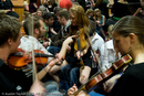 Festival goers and sessions at the Folk Festival Club for the 29th Shetland Folk Festival 2009