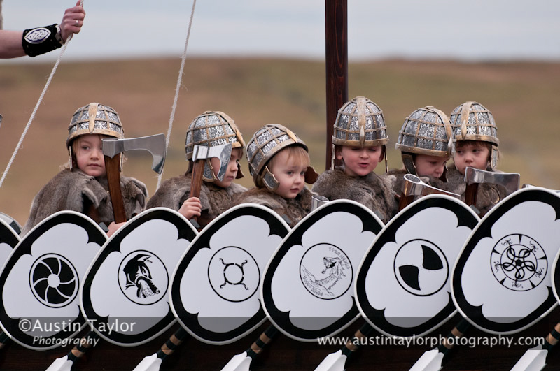 Up Helly-Aa 2011: morning procession - youg boys in the Jarl Sqaud waiting for the arrival of the Jarl Squad at Alexandra Wharf