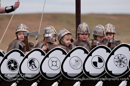 Up Helly-Aa 2011: morning procession - youg boys in the Jarl Sqaud waiting for the arrival of the Jarl Squad at Alexandra Wharf