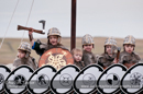 Up Helly-Aa 2011: morning procession - youg boys in the Jarl Sqaud welcome the arrival of the Jarl Squad at Alexandra Wharf