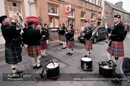 Up Helly-Aa 2011: morning procession - Lerwick Royal British Legion Pipe Band lead the Junior Jarl Squad through Commercial Street