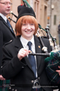 Up Helly-Aa 2011: morning procession - Rona with Lerwick Royal British Legion Pipe Band lead the Junior Jarl Squad through Commercial Street