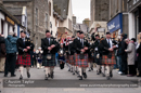 Up Helly-Aa 2011: morning procession - Lerwick Royal British Legion Pipe Band lead the Junior Jarl Squad through Commercial Street