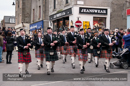 Up Helly-Aa 2011: morning procession - Lerwick Royal British Legion Pipe Band lead the Junior Jarl Squad through Commercial Street