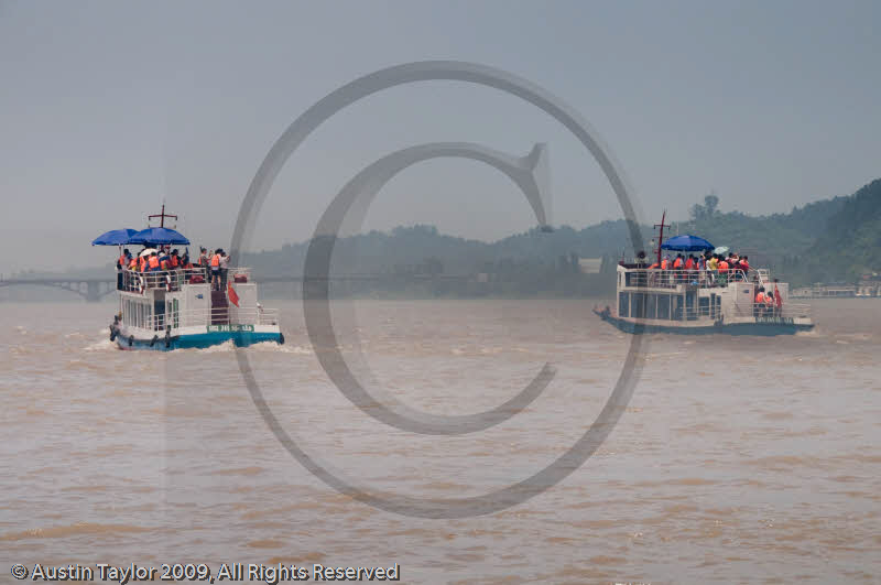 Boats for tourists to view Leshan Giant Buddha, Min River, Sichuan