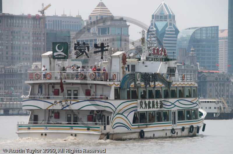 Ships, boats and buildings along the Huangpu River, central Shanghai