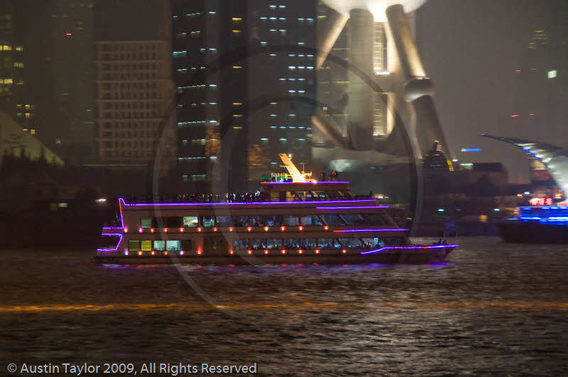 Illuminated sightseeing boats on the Huangpu River at night, Shanghai