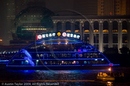 Illuminated sightseeing boats on the Huangpu River at night, Shanghai