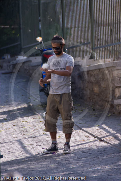 Man playing with ball, Athens, 20 September 2007