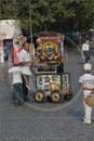 Man and boy collecting with street organ Athens, Greece 21 September 2007